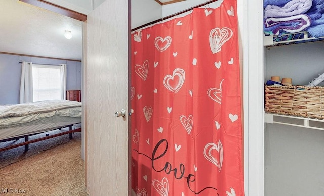 full bath with a shower with shower curtain and crown molding