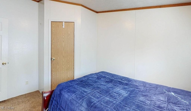 carpeted bedroom with vaulted ceiling