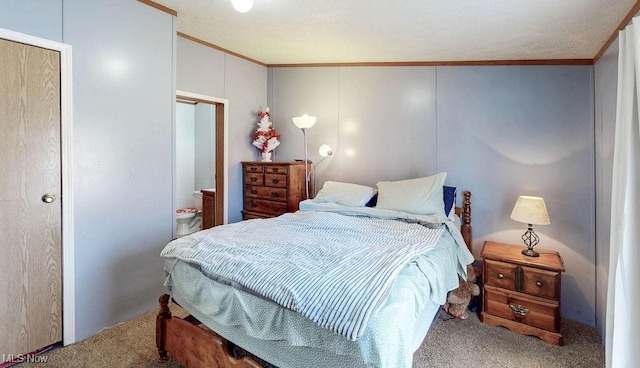 carpeted bedroom with crown molding