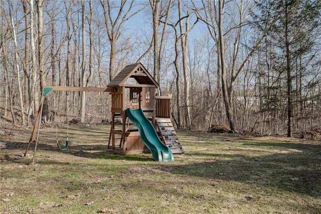 view of playground with a yard