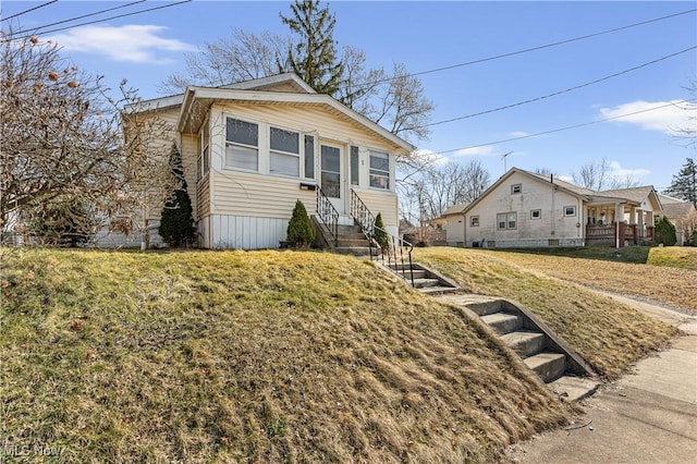 view of front of home with entry steps