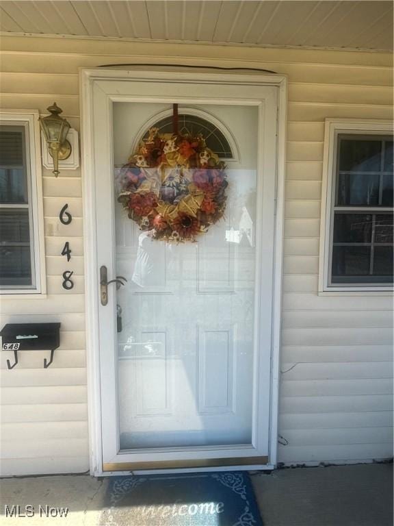 entrance to property with a porch