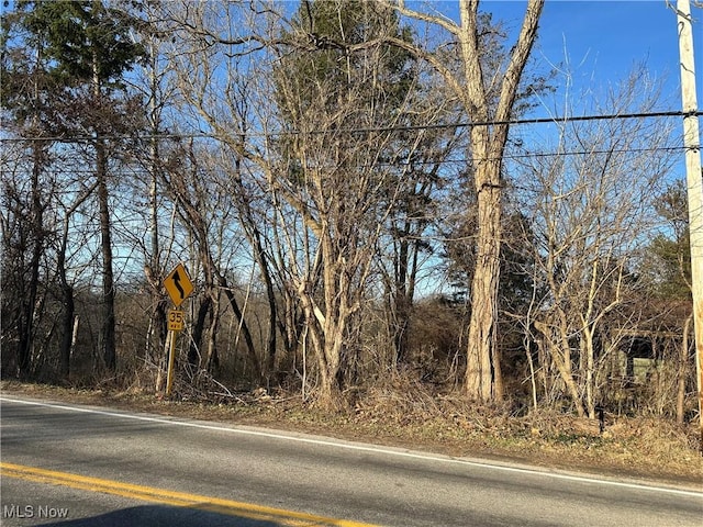 view of road with traffic signs