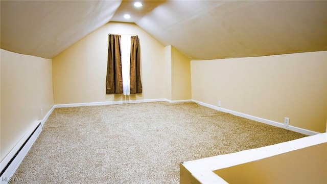 additional living space with lofted ceiling, baseboards, carpet floors, and a baseboard radiator