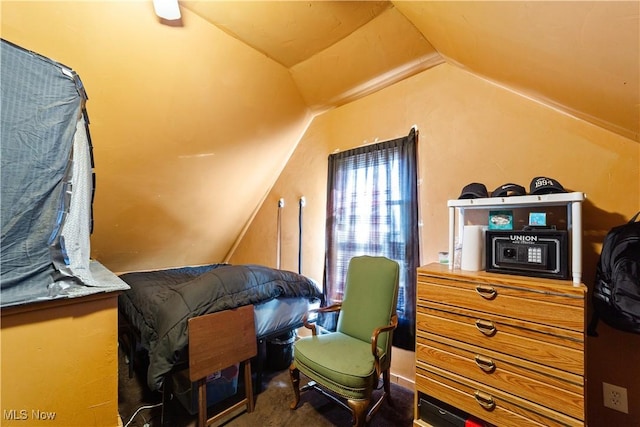 bedroom with vaulted ceiling