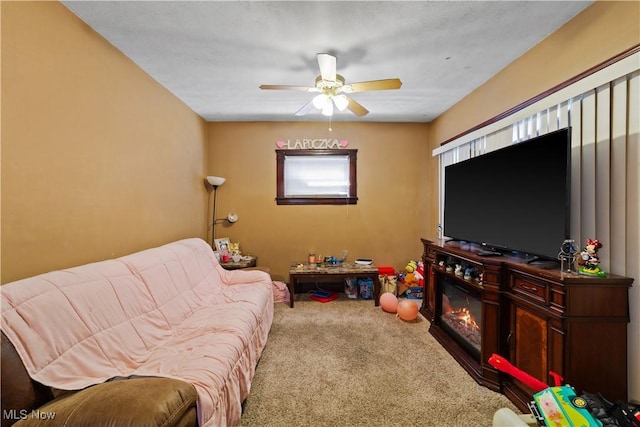 living room with carpet floors and ceiling fan