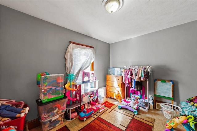 game room with carpet flooring