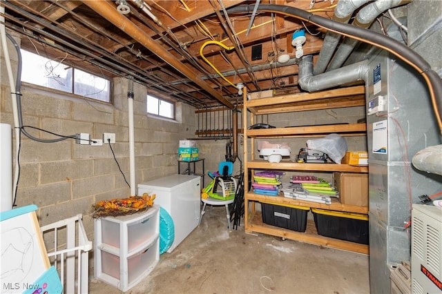 basement featuring refrigerator