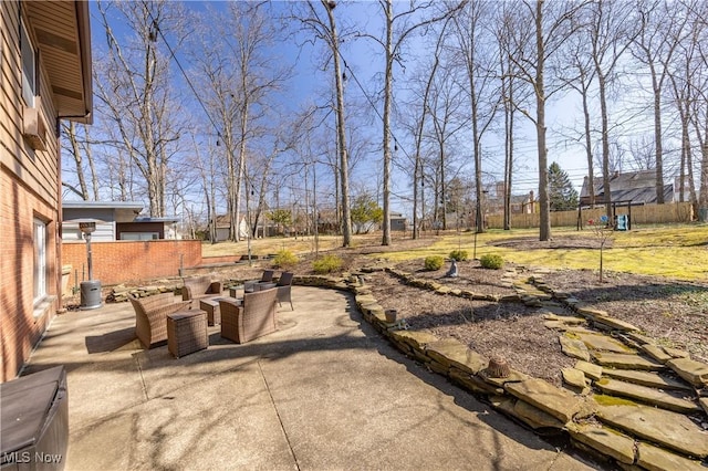 view of yard with a patio and fence