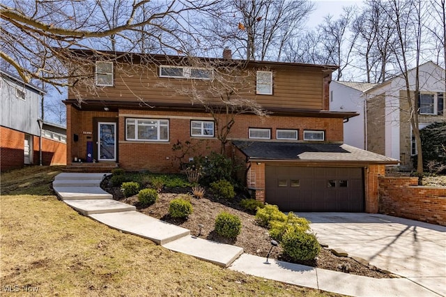 view of front of home featuring brick siding, driveway, and a garage