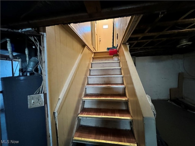 staircase featuring water heater