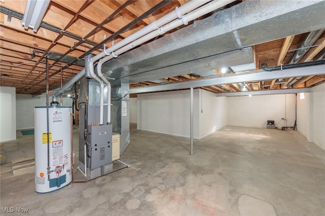 basement with heating unit and water heater