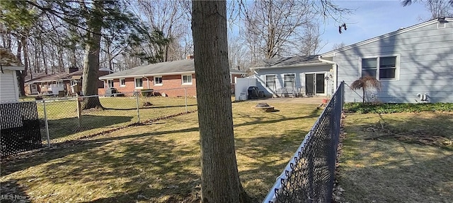 view of yard with a fenced backyard