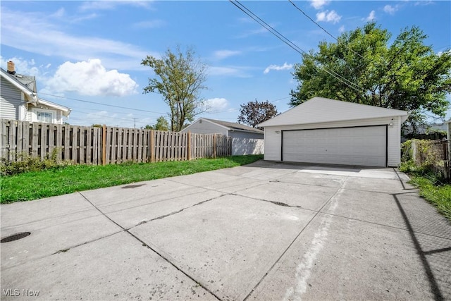 detached garage with fence