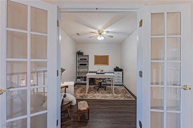 home office with wood finished floors, french doors, and ceiling fan