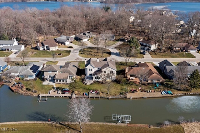 birds eye view of property with a residential view and a water view