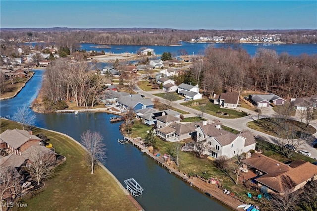 aerial view with a residential view and a water view