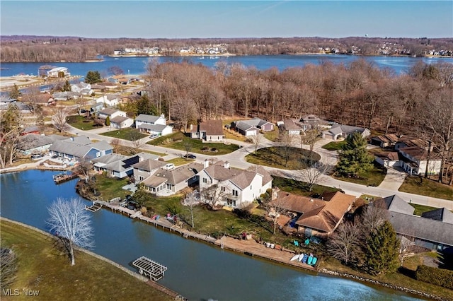 aerial view with a residential view and a water view