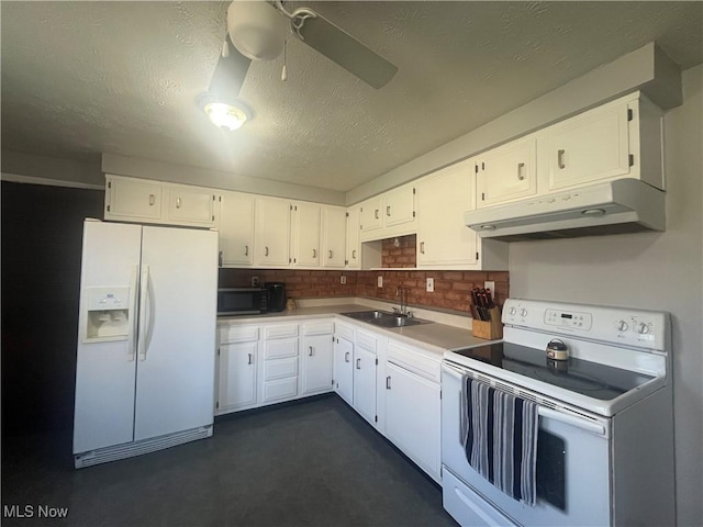 kitchen with ceiling fan, under cabinet range hood, white appliances, white cabinetry, and a sink