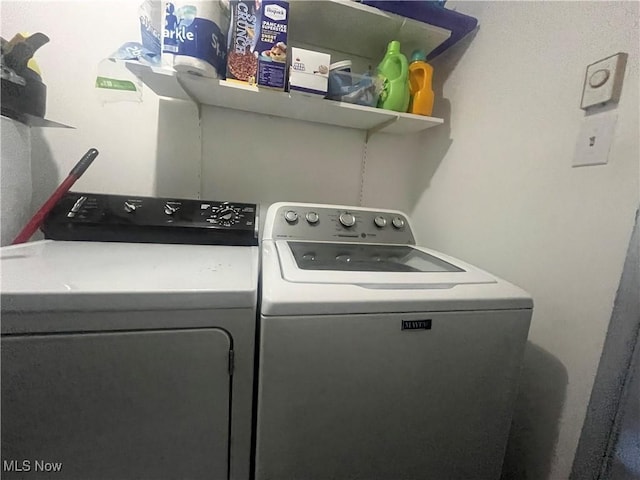 washroom with laundry area and independent washer and dryer