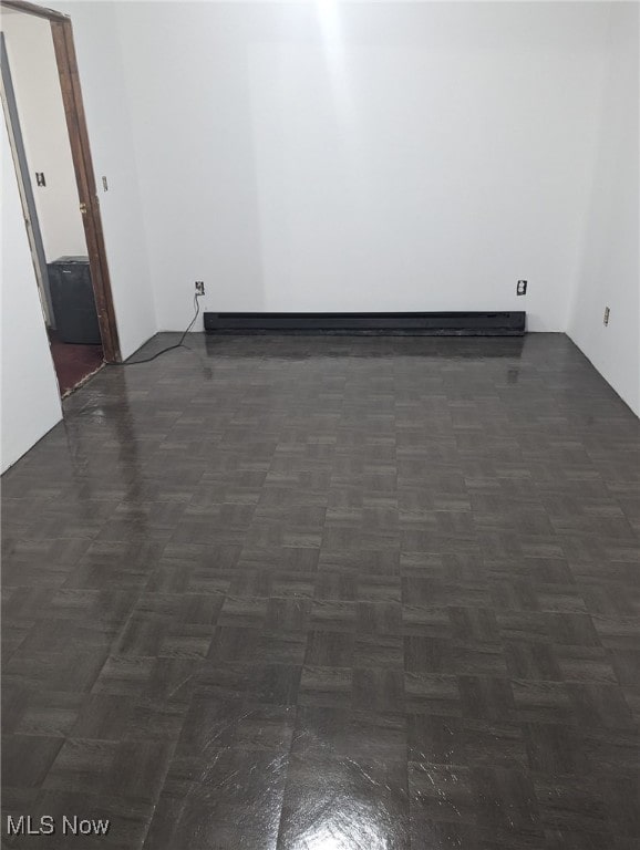 empty room with baseboard heating