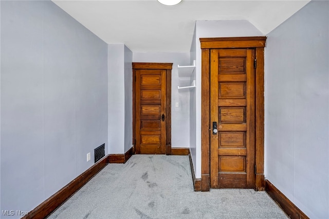 interior space with visible vents and baseboards