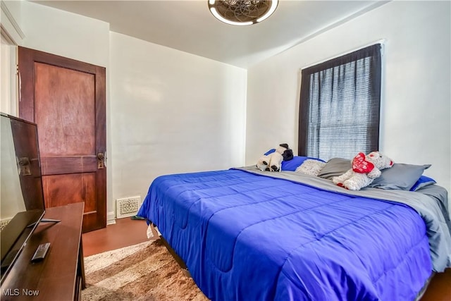 bedroom with visible vents