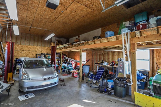 garage featuring a garage door opener