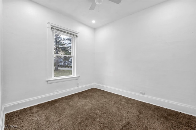 unfurnished room featuring recessed lighting, dark carpet, baseboards, and ceiling fan