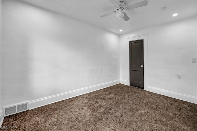 unfurnished room featuring a ceiling fan, baseboards, visible vents, recessed lighting, and dark carpet