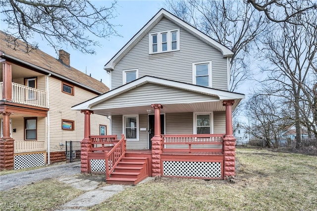 traditional style home featuring a porch