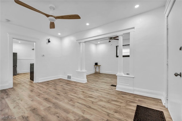 interior space with recessed lighting, visible vents, light wood-style flooring, and ceiling fan