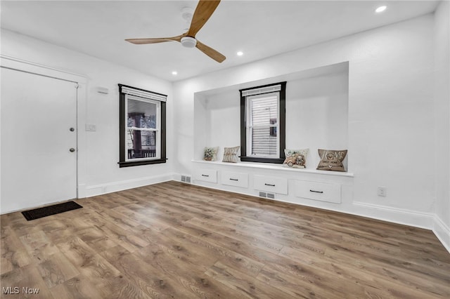 foyer with visible vents, recessed lighting, ceiling fan, and wood finished floors