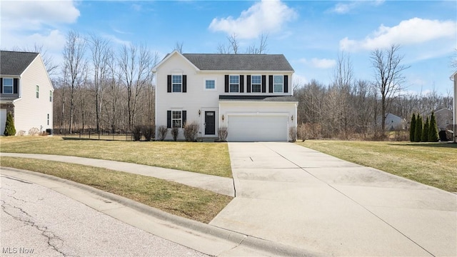 traditional-style house with a front lawn, a garage, and driveway