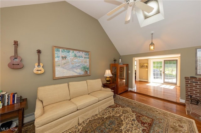 living area with wood finished floors, a ceiling fan, baseboards, high vaulted ceiling, and baseboard heating