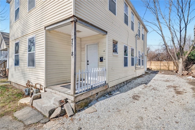 view of front of house with fence