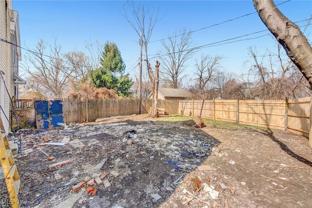 view of yard featuring a fenced backyard