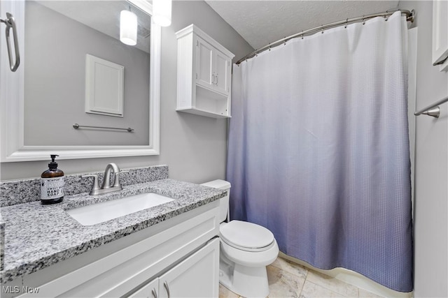 bathroom featuring tile patterned floors, a shower with shower curtain, toilet, and vanity