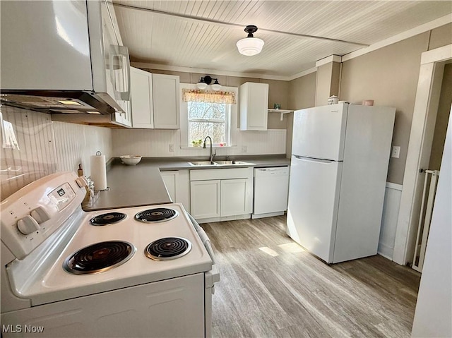 kitchen with light wood-style flooring, white appliances, white cabinets, and a sink