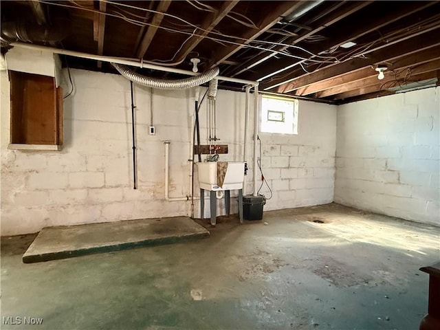 basement with a sink