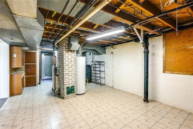 unfinished basement with gas water heater and tile patterned floors