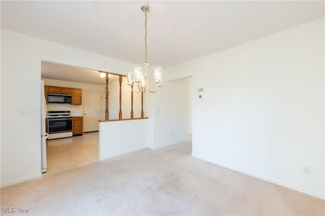 interior space featuring an inviting chandelier, baseboards, and light carpet