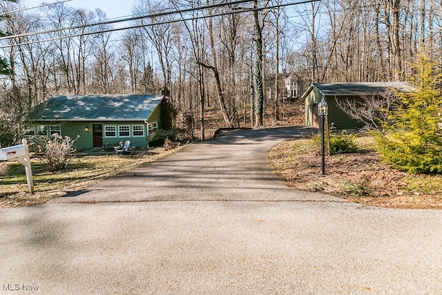 view of street featuring driveway