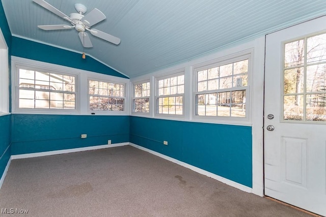 unfurnished sunroom with plenty of natural light, ceiling fan, and lofted ceiling