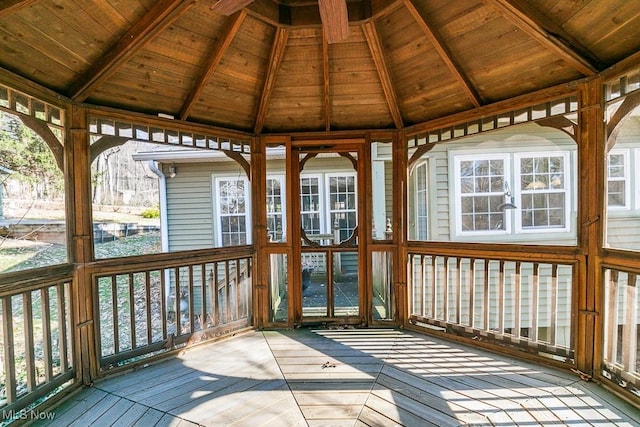 wooden terrace featuring a gazebo