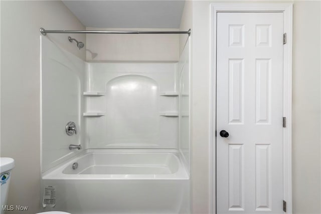 full bathroom with toilet and bathing tub / shower combination