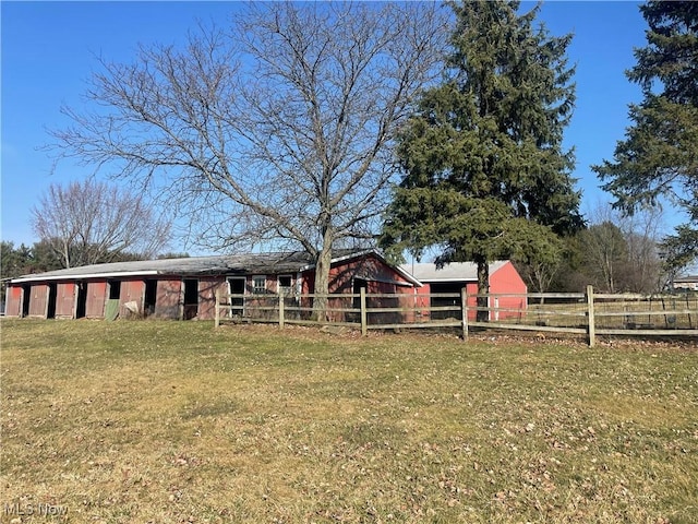 exterior space featuring an outbuilding and an exterior structure