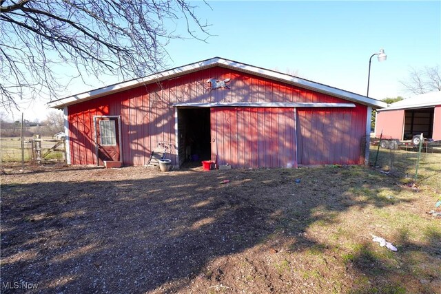 3390 Meese Rd NE, Louisville, OH 44641 - view of pole building featuring fence