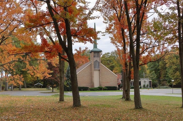 view of home's exterior featuring a lawn