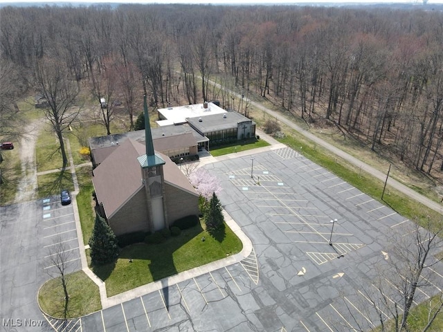 bird's eye view featuring a forest view